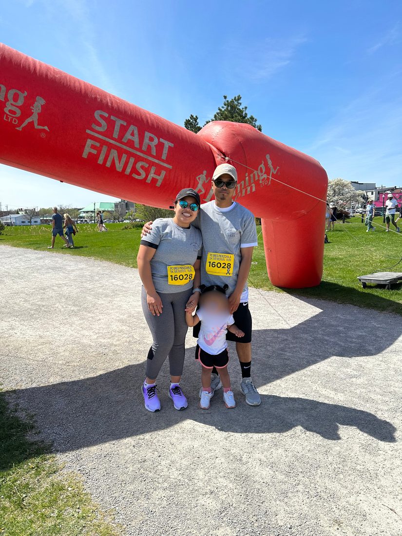 Family at a charity 5K finish line